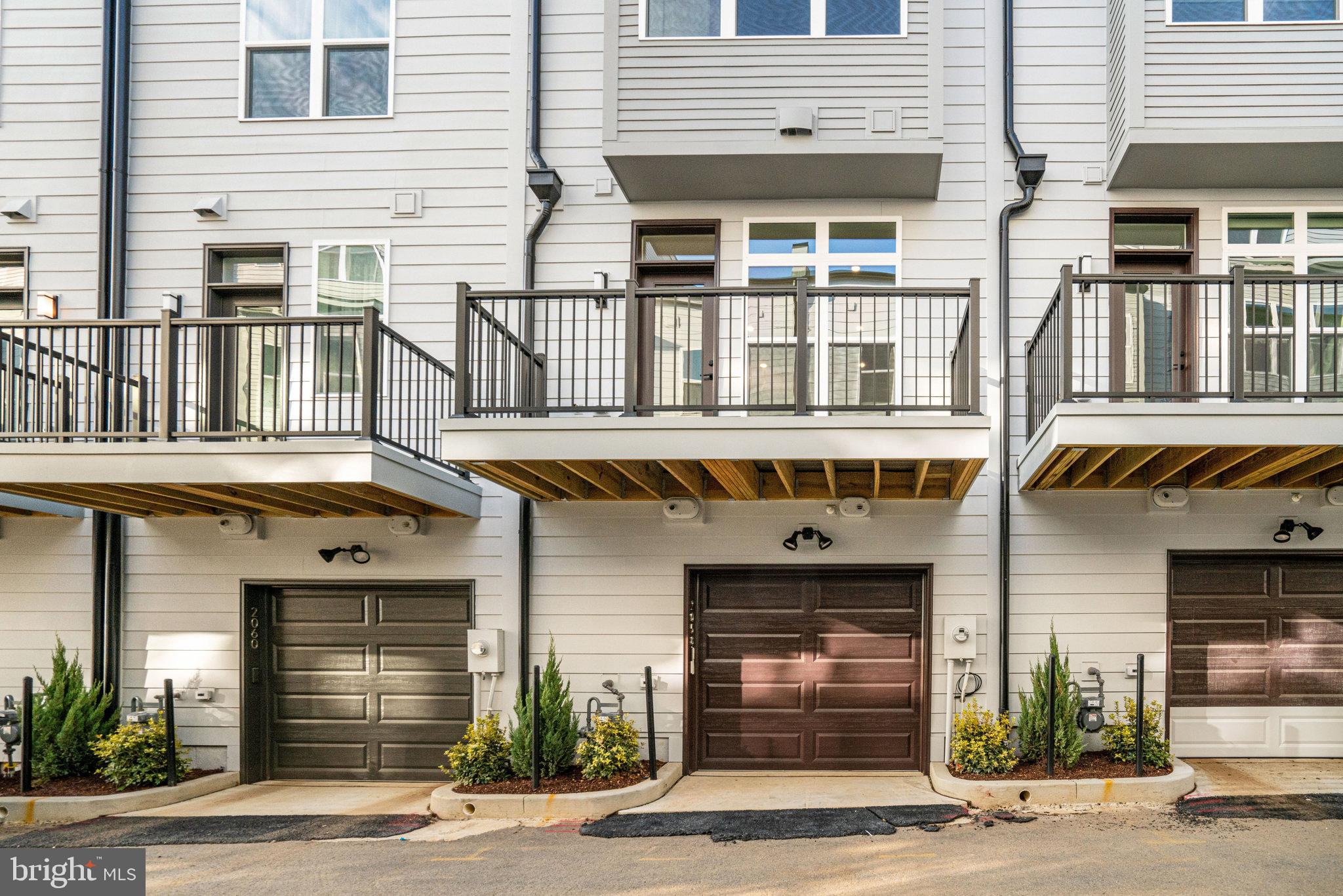 2058 Tysons Ridgeline Road Falls Church, VA 22043 - Photo 41 of 48 a front view of a building with a street