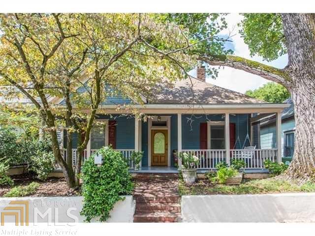 Welcome home to this gorgeous center hall Craftsman bungalow in the heart of Cabbagetown!