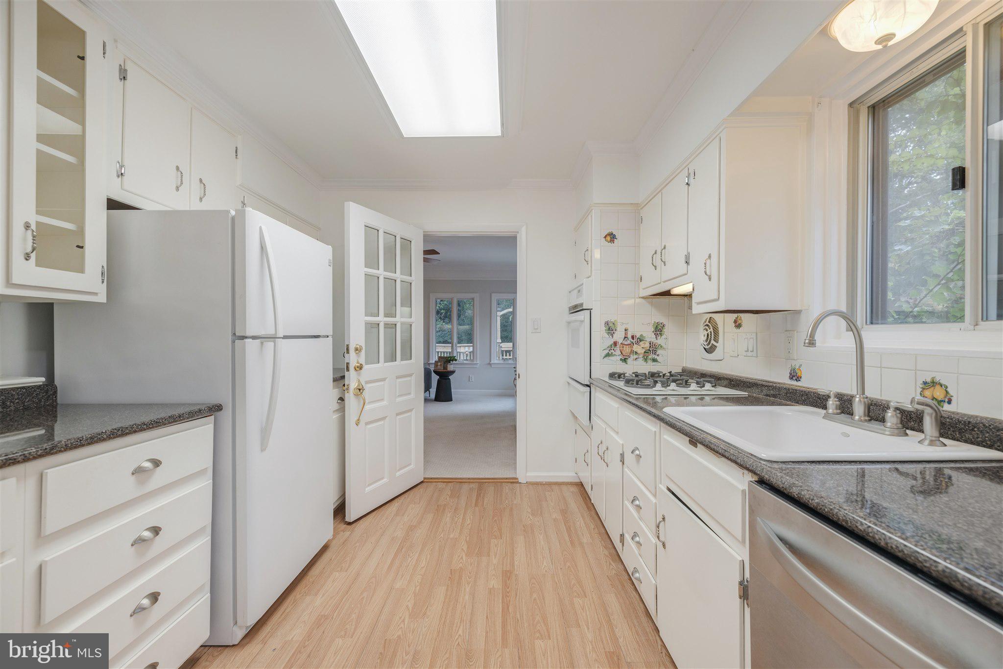 3907 Littleton Street Silver Spring, MD 20906 - Photo 11 of 49 updated Kitchen, view towards Sunroom addition