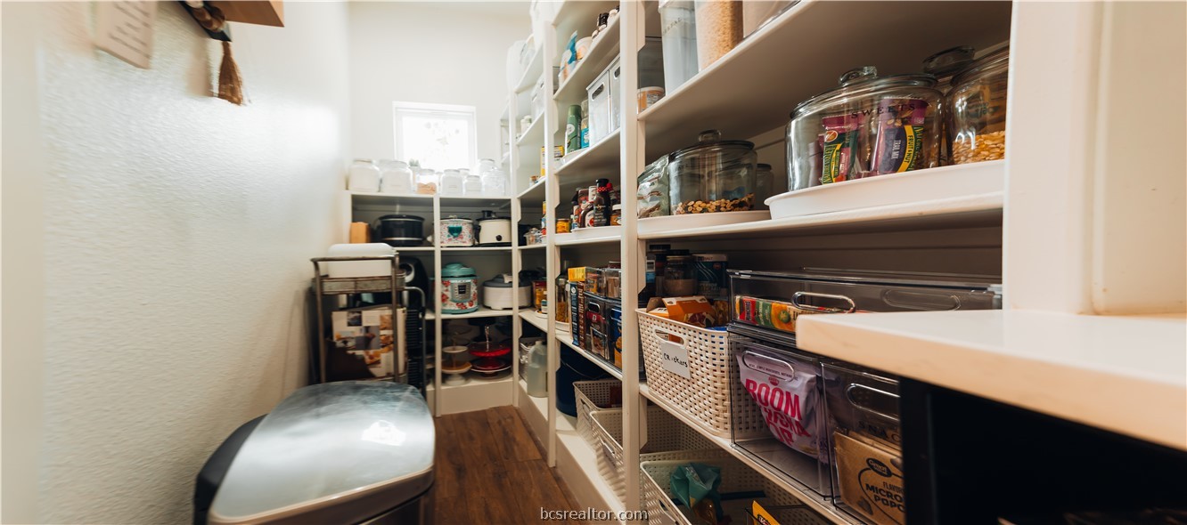 5036 Glory Road Bryan, TX 77808 - Photo 34 of 50 Bulters pantry, custom with shelves and coffee station