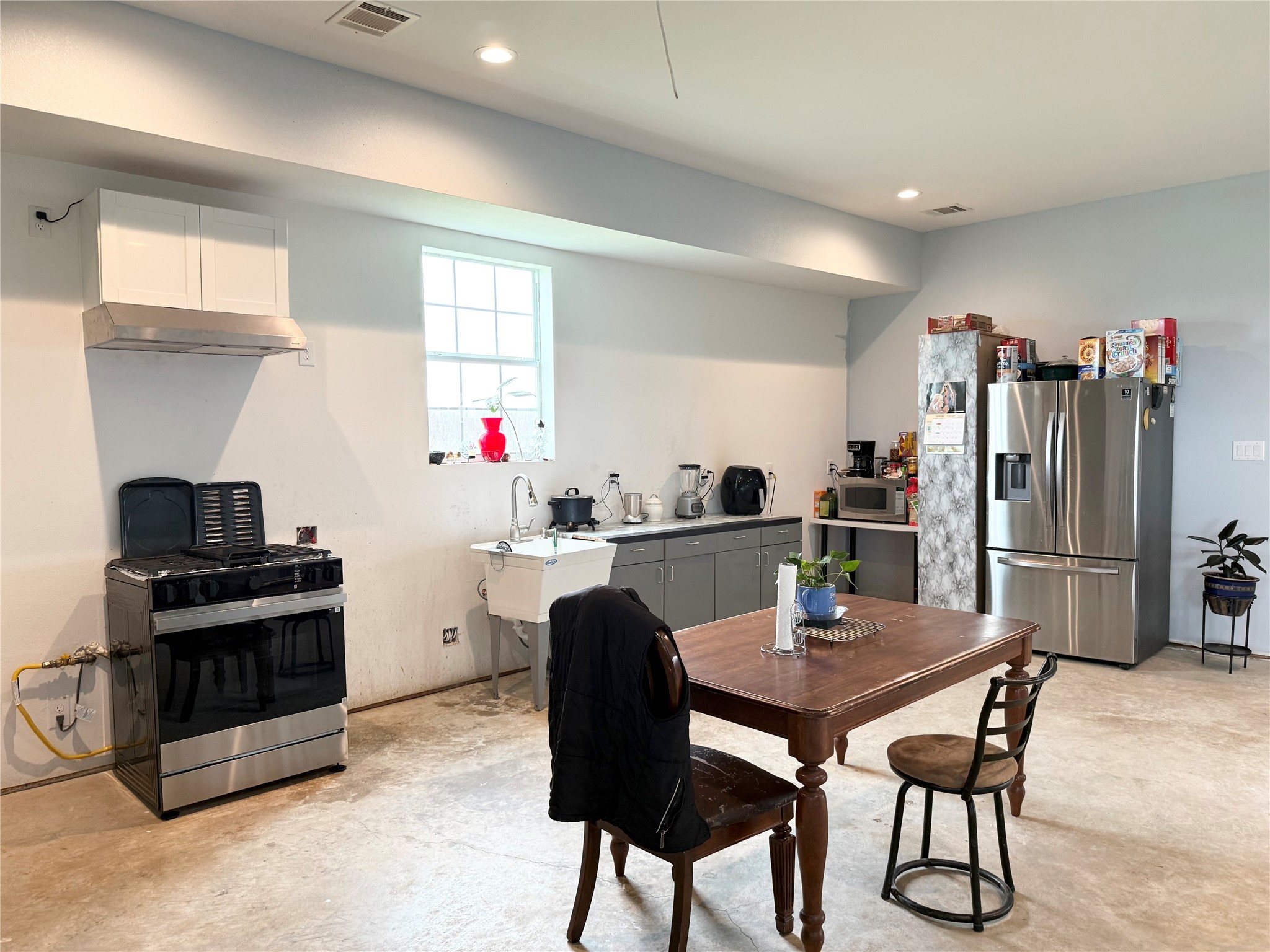 8570 Sunny Side Road Brookshire, TX 77423 - Photo 12 of 37 Kitchen area needs cabinetry and counterops; appliances are negotiable