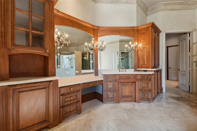 a large bathroom with a large tub and sink