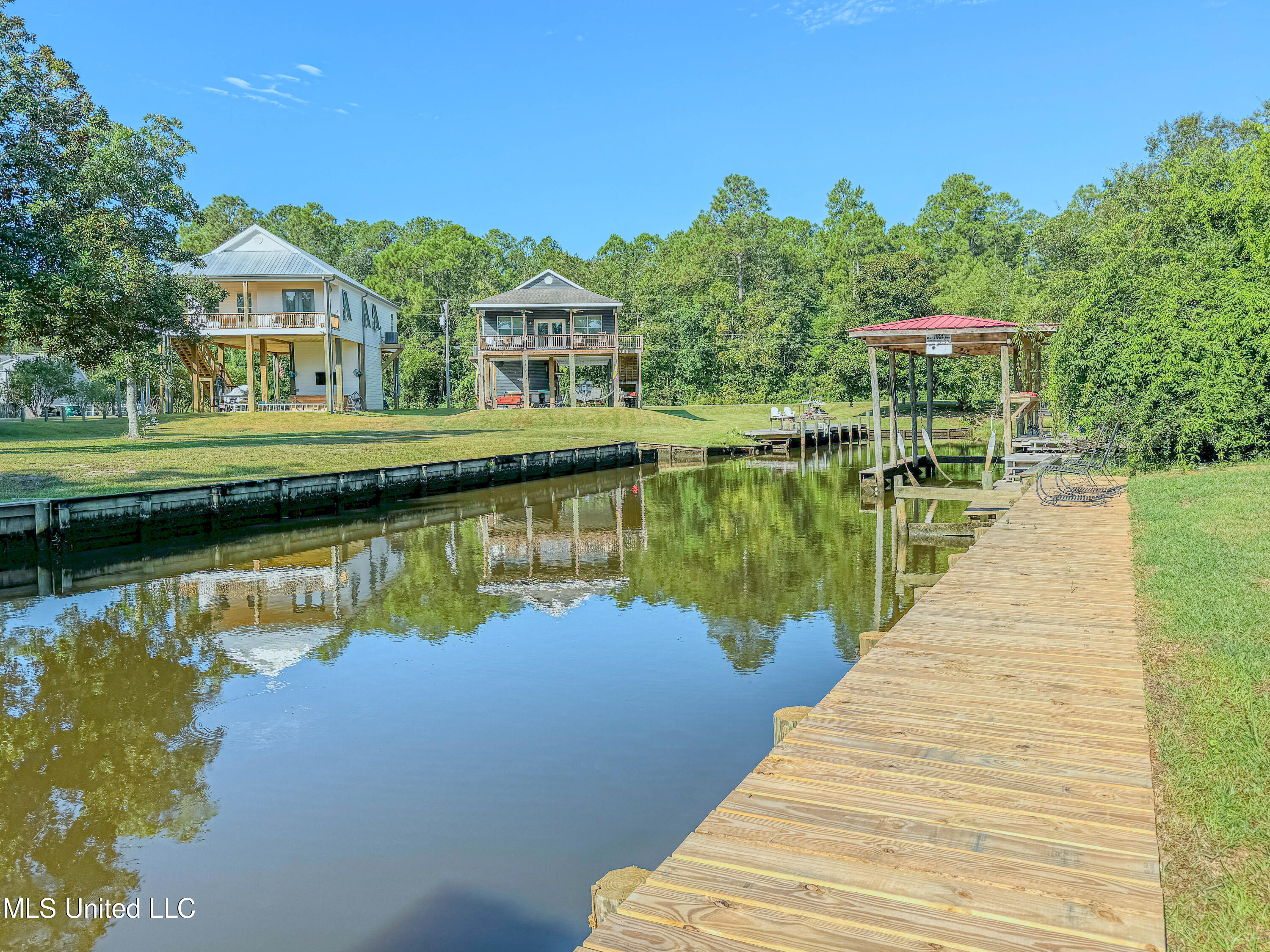 6085 Apache Drive Kiln, MS 39556 - Photo 16 of 16 Dock in backyard