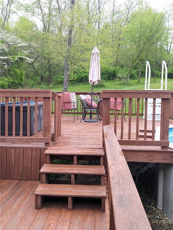 699 Dillie Road Sycamore, PA 15329 - Photo 5 of 21 a view of a patio with a table and chairs