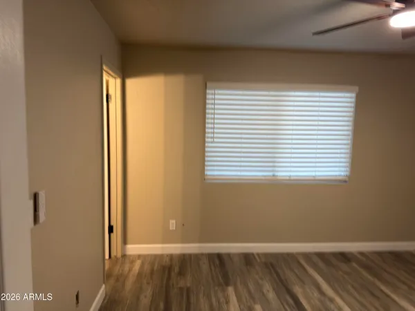 a view of a room that has a window in it