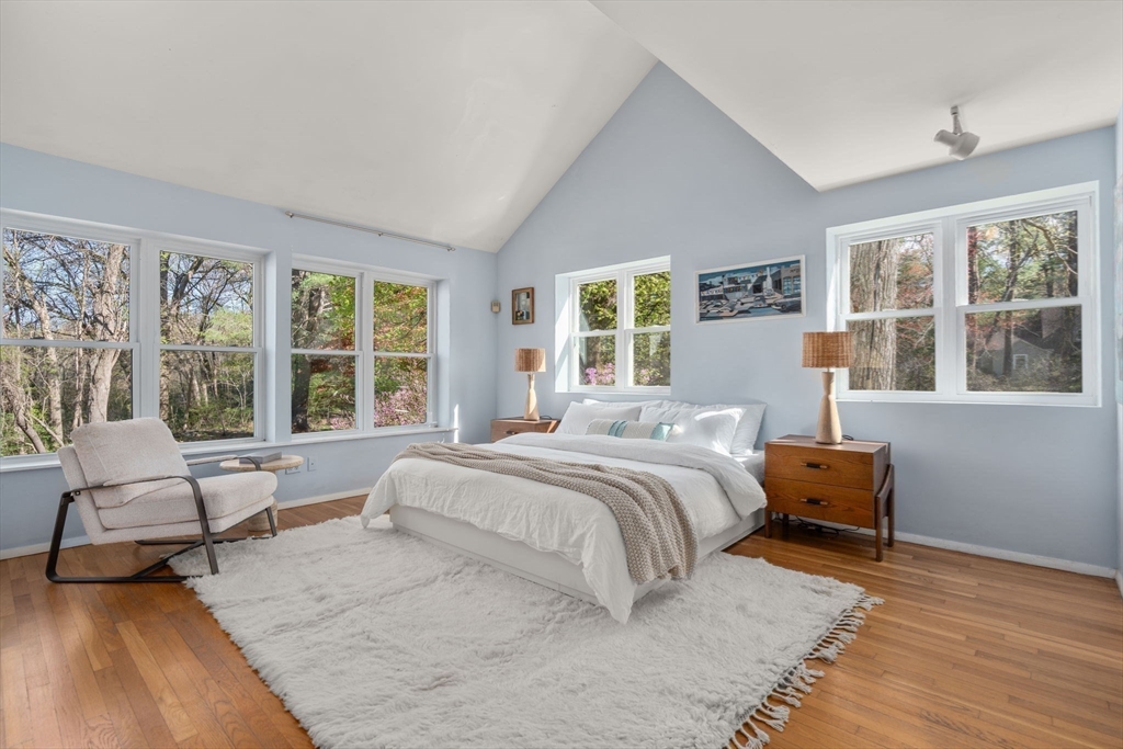 12 Granison Road Weston, MA 02493 - Photo 16 of 32 a bedroom with a bed and wooden floor