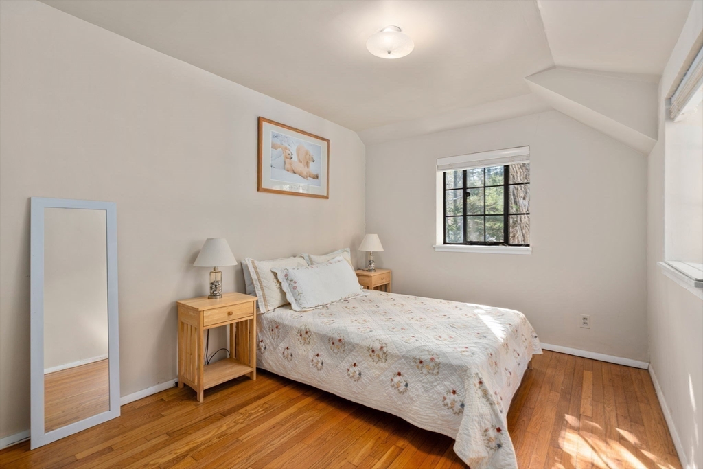 12 Granison Road Weston, MA 02493 - Photo 19 of 32 a bedroom with a bed and wooden floor