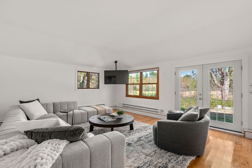 12 Granison Road Weston, MA 02493 - Photo 23 of 32 a living room with furniture and a window