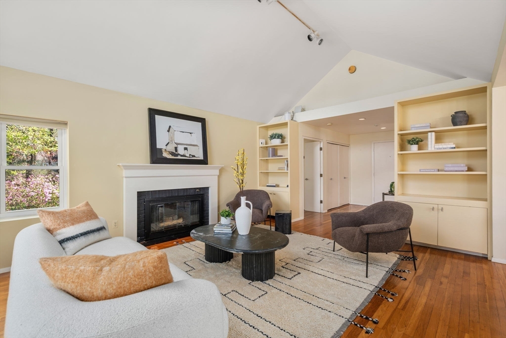 12 Granison Road Weston, MA 02493 - Photo 6 of 32 a living room with furniture and a fireplace