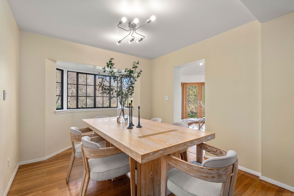 12 Granison Road Weston, MA 02493 - Photo 8 of 32 a view of a dining room with furniture and chandelier