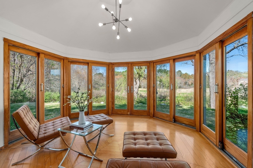 12 Granison Road Weston, MA 02493 - Photo 9 of 32 a living room with furniture and large windows