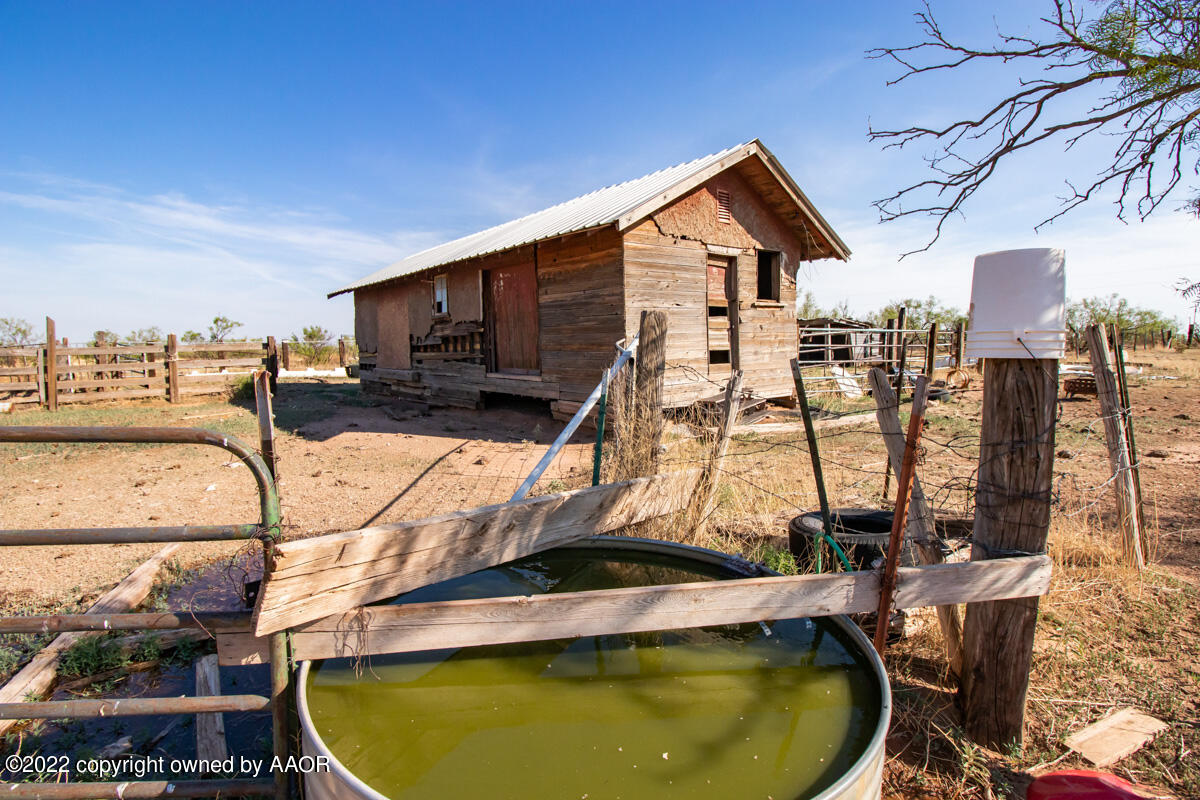 Lazy Arrow B Ranch Amarillo, TX 79124 - Photo 43 of 59 a view of a house with swimming pool