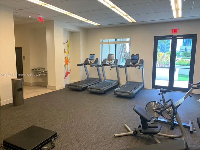 a view of a room with gym equipment