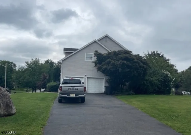a car parked in front of a house