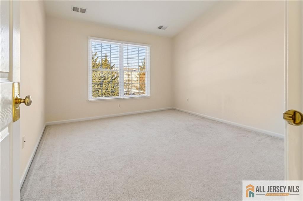 14 Caleb Lane Princeton, NJ 08540 - Photo 41 of 55 a view of an empty room with a window