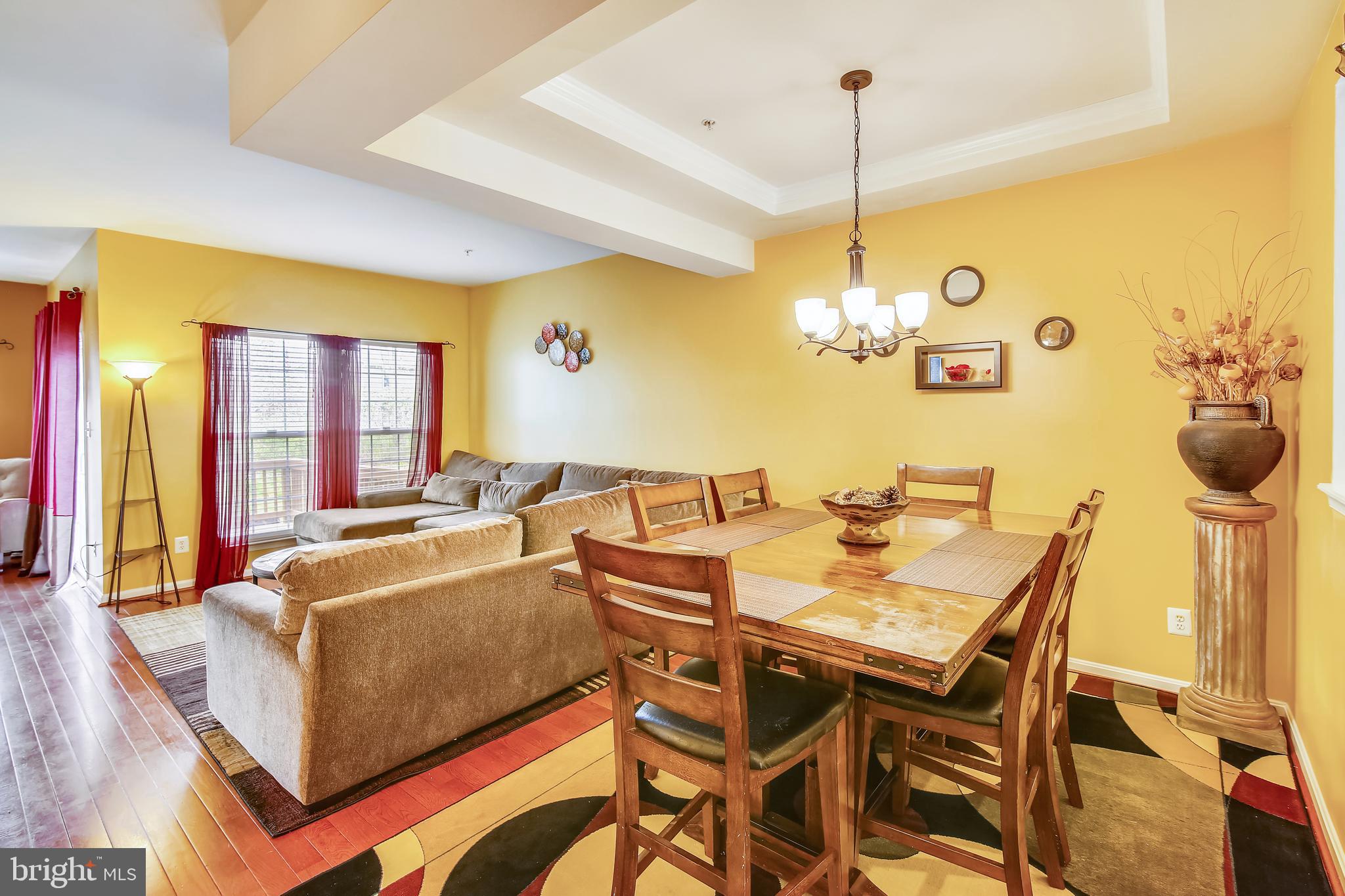 1924 Waltman Road Edgewood, MD 21040 - Photo 10 of 33 a view of a dining room with furniture and a chandelier