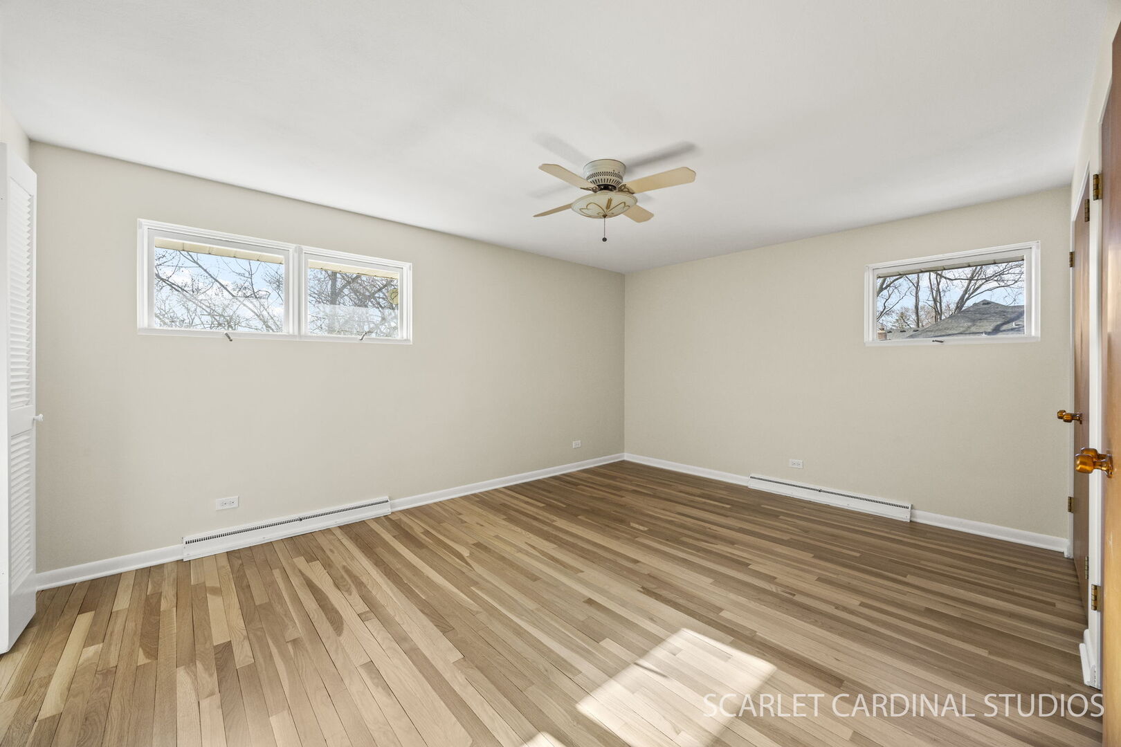 1210 Lawnmeadow Lane Naperville, IL 60540 - Photo 16 of 37 a view of an empty room with wooden floor
