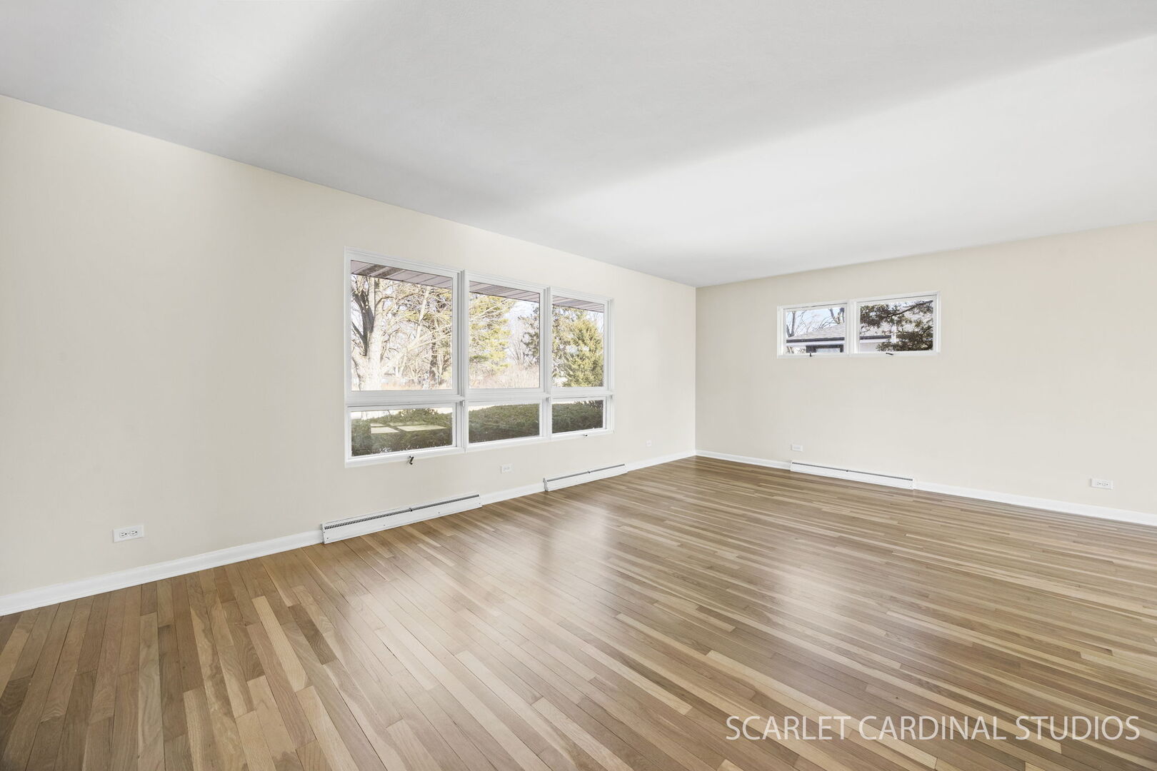1210 Lawnmeadow Lane Naperville, IL 60540 - Photo 4 of 37 an empty room with wooden floor and windows