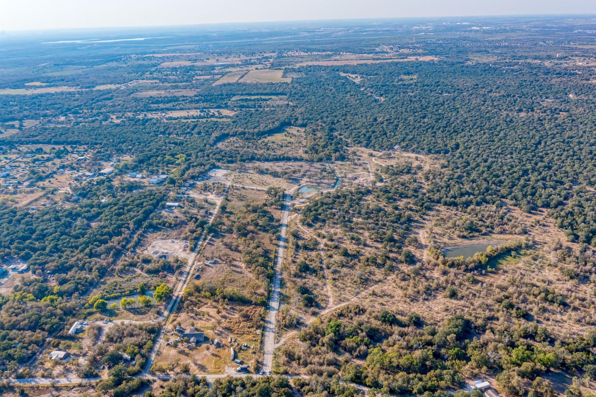 9202 Lockwood Springs Road Manor, TX 78653 - Photo 23 of 27 a view of a field with an ocean