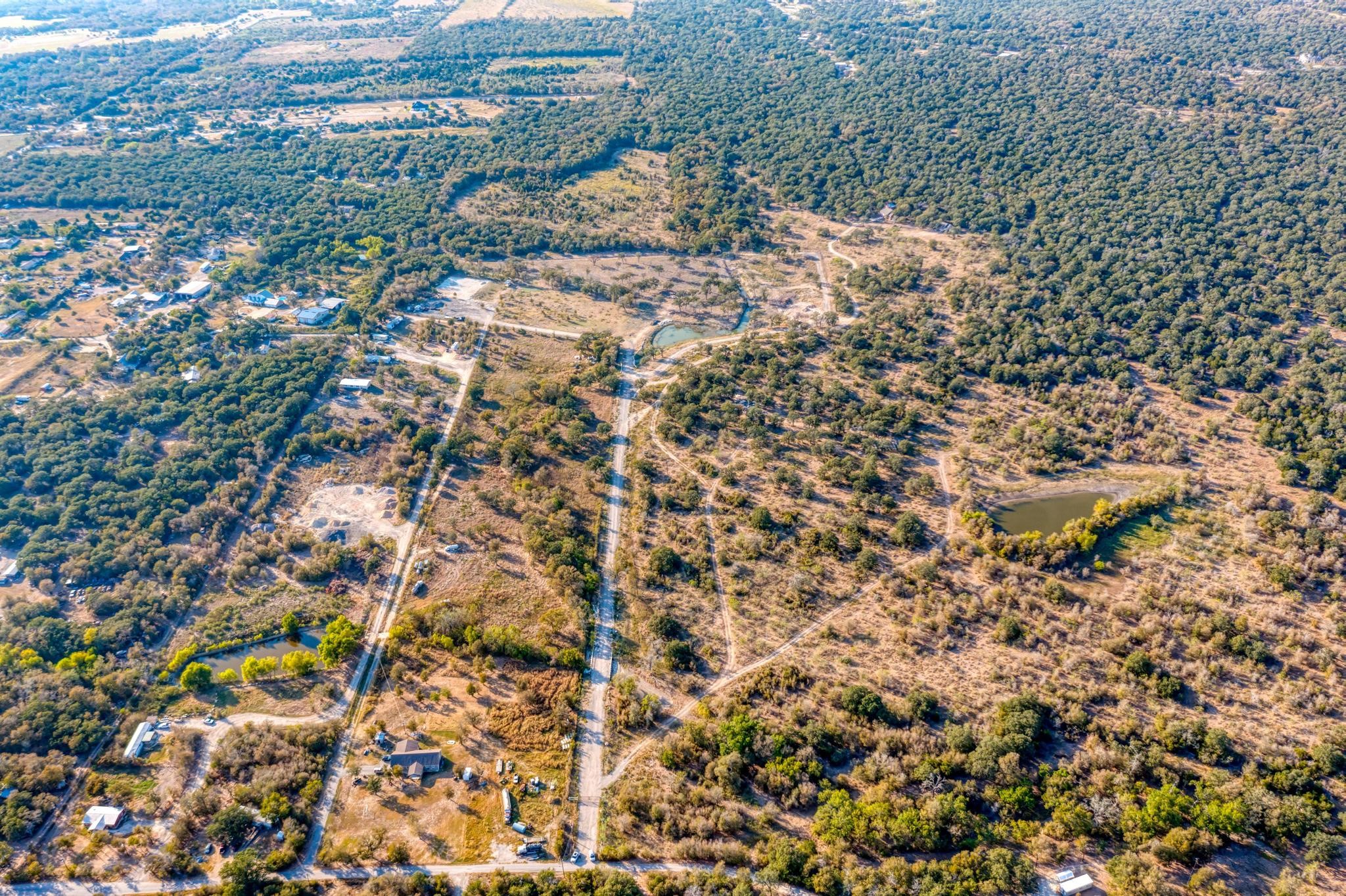 9202 Lockwood Springs Road Manor, TX 78653 - Photo 24 of 27 a view of a yard