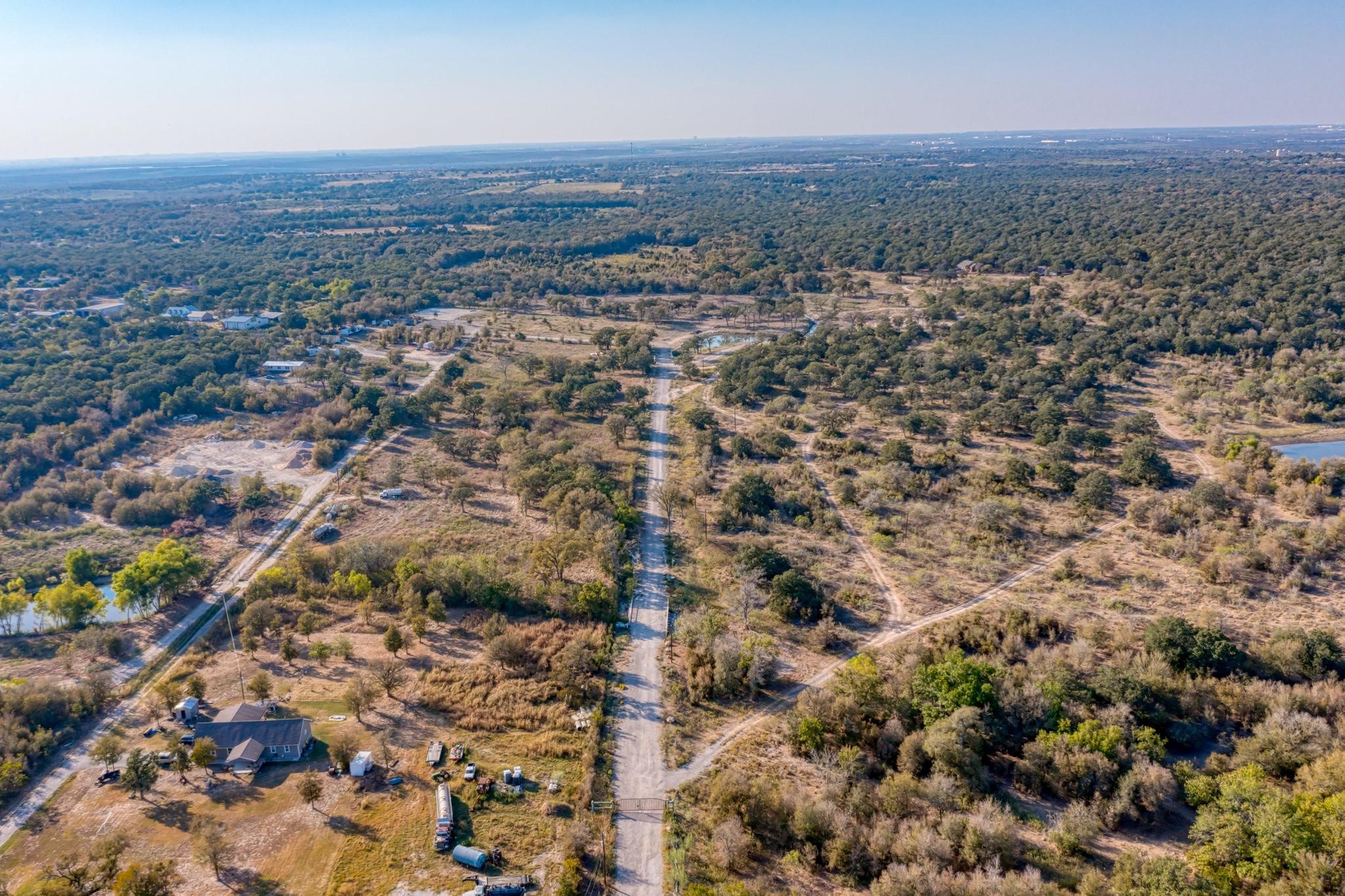 9202 Lockwood Springs Road Manor, TX 78653 - Photo 4 of 27 an aerial view of multiple house