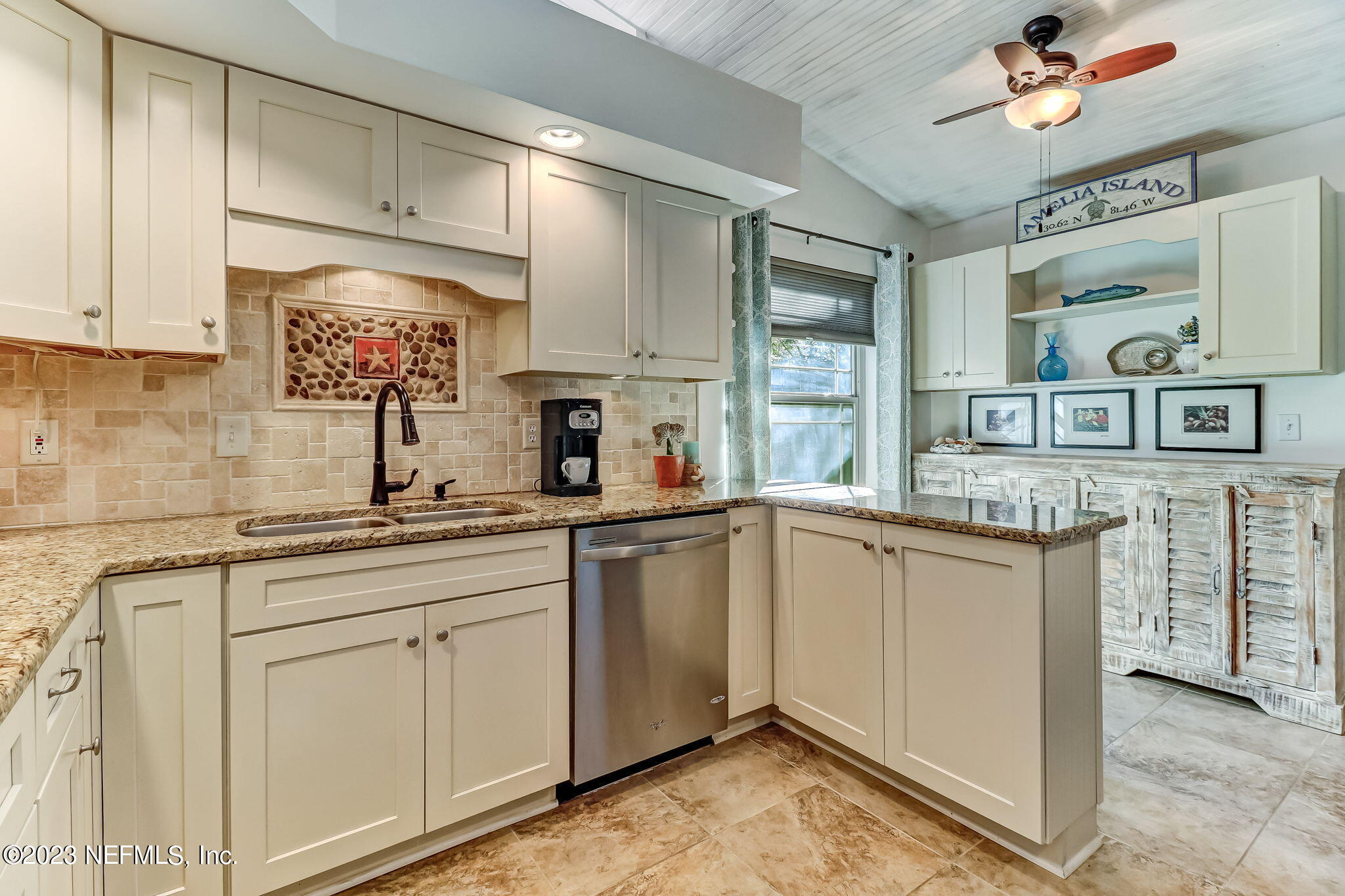 2212 Will Hardee Road Fernandina Beach, FL 32034 - Photo 8 of 24 a kitchen with stainless steel appliances granite countertop a sink and cabinets