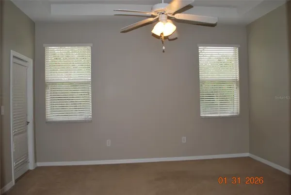 a view of a room that has a window