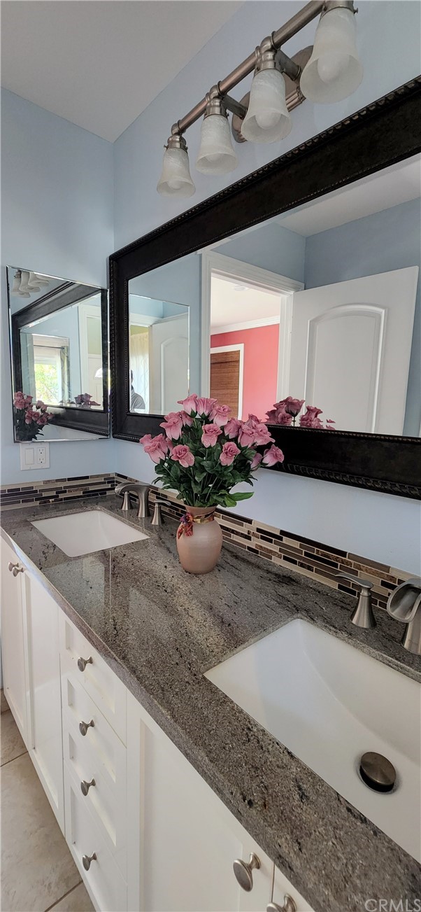 230 San Antonio Road Arcadia, CA 91007 - Photo 16 of 25 a kitchen with a sink and a stove
