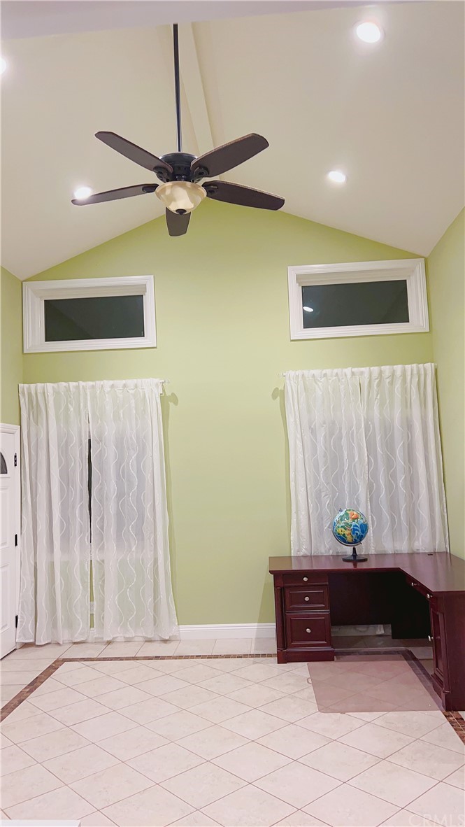 230 San Antonio Road Arcadia, CA 91007 - Photo 6 of 25 a living room with a couch and a ceiling fan