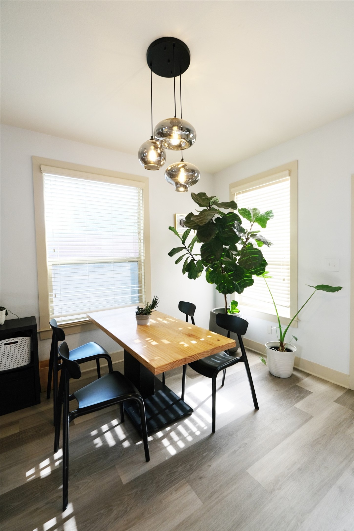 604 Allen Street, Unit 104 Austin, TX 78702 - Photo 4 of 16 a view of a dining room with furniture and window