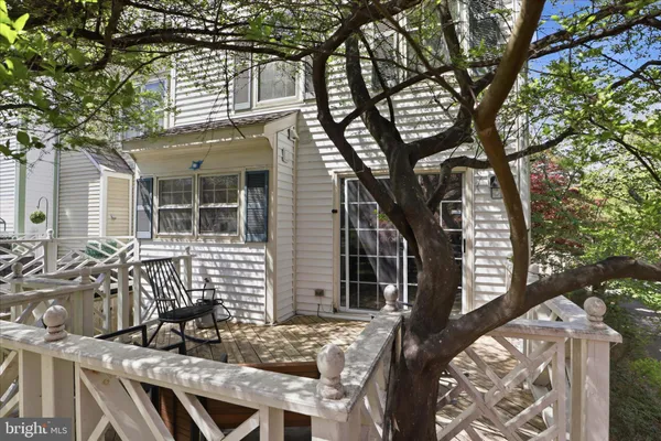 a view of a house with a tree