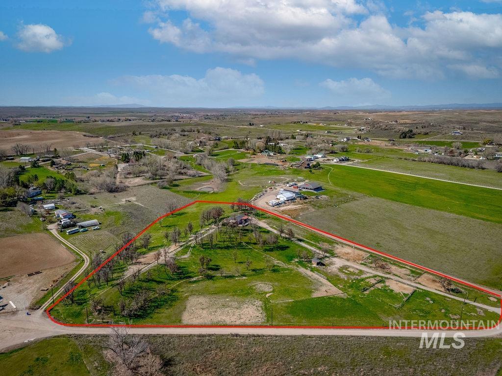 7370 Sagebrush Lane Caldwell, ID 83607 - Photo 2 of 40 Aerial view of sparsely populated area featuring property parcel outlined