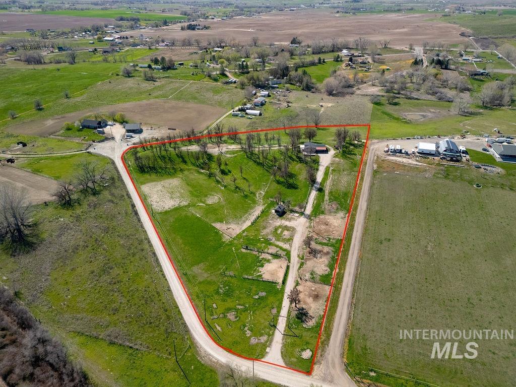 7370 Sagebrush Lane Caldwell, ID 83607 - Photo 4 of 40 Aerial view of sparsely populated area featuring property boundaries highlighted