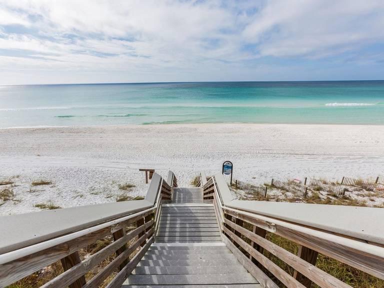 249 Milestone Dr Inlet Beach, Unit A Inlet Beach, FL 32461 - Photo 17 of 18 a view of a terrace with wooden floor and a seating space