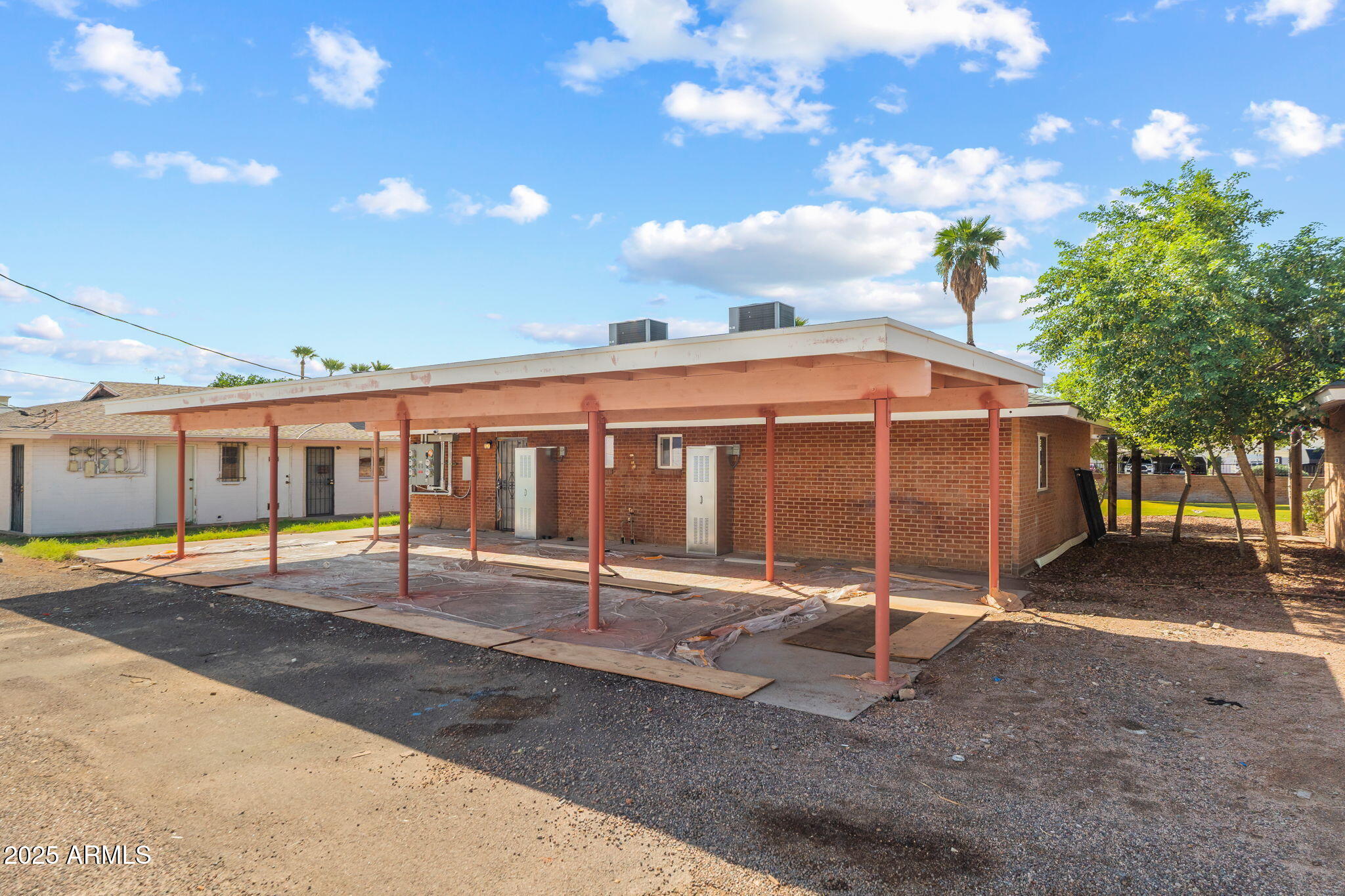1940 West Amelia Avenue, Unit 1940 Phoenix, AZ 85015 - Photo 17 of 17 a view of a house with a yard