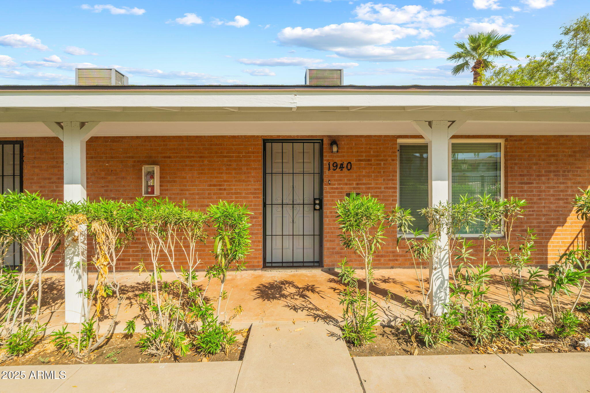 1940 West Amelia Avenue, Unit 1940 Phoenix, AZ 85015 - Photo 4 of 17 a view of a entryway door front of house