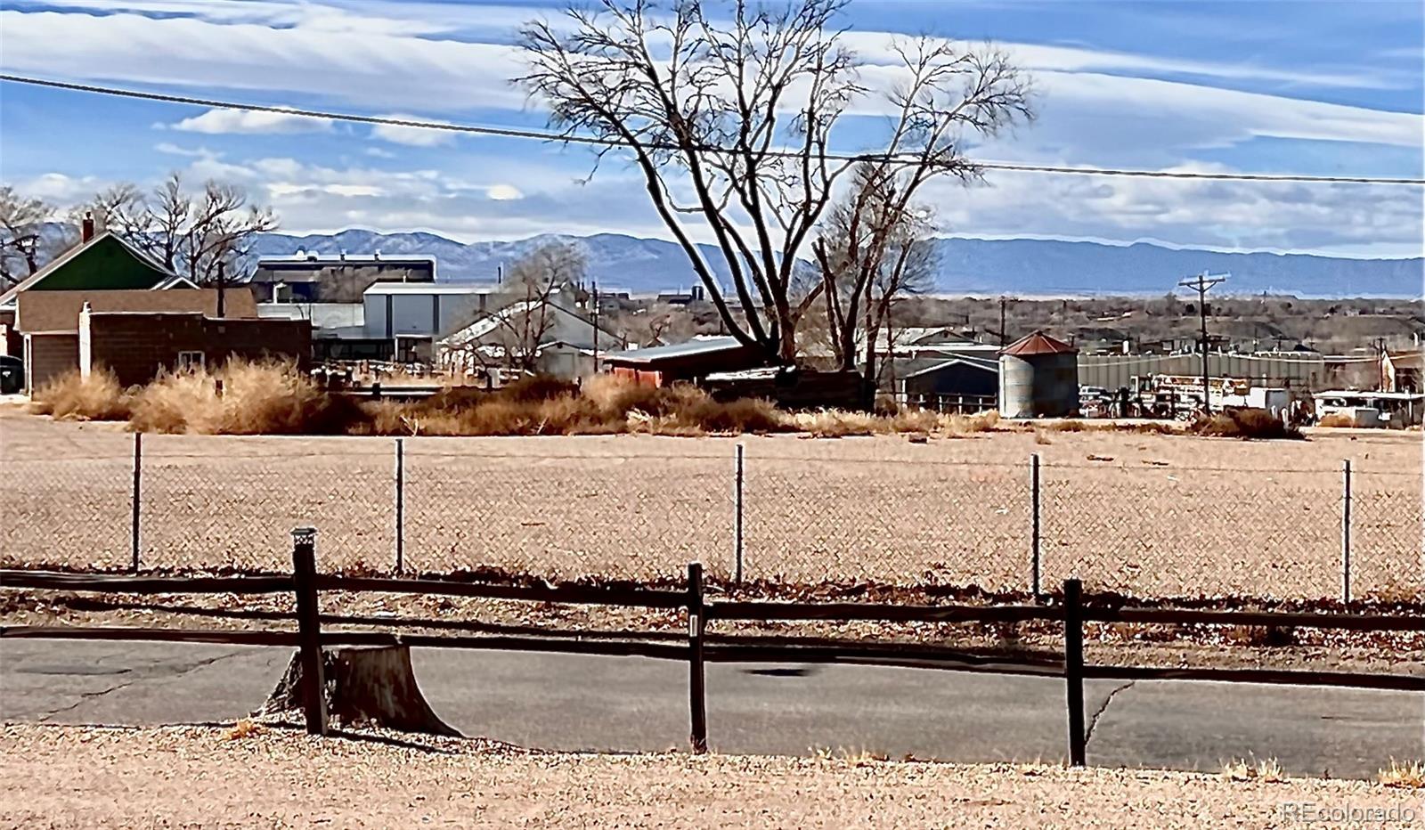 1002 Frontier Street Pueblo, CO 81006 - Photo 25 of 26 a view of a terrace with wooden fence
