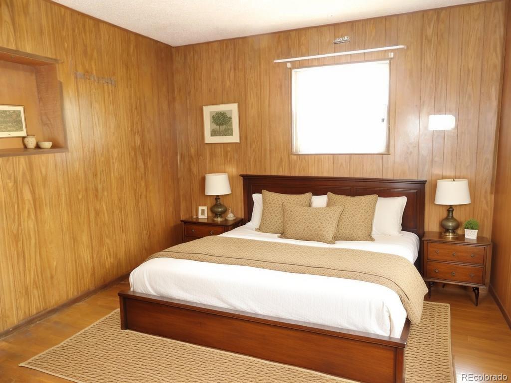 1002 Frontier Street Pueblo, CO 81006 - Photo 6 of 26 a bedroom with a bed and a window