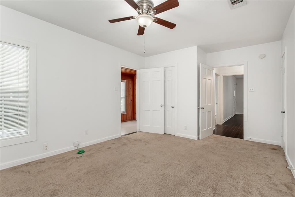 7414 Robin Road Dallas, TX 75209 - Photo 21 of 31 a view of an empty room with a window