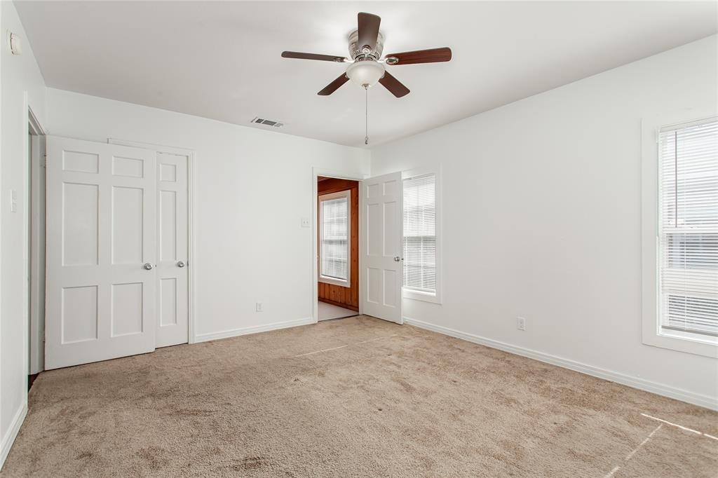 7414 Robin Road Dallas, TX 75209 - Photo 26 of 31 a view of a livingroom with a ceiling fan and window