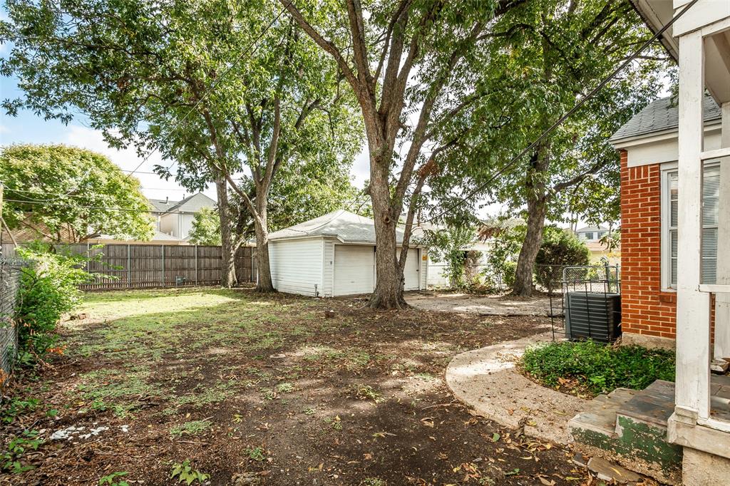 7414 Robin Road Dallas, TX 75209 - Photo 29 of 31 a house with trees in front of it
