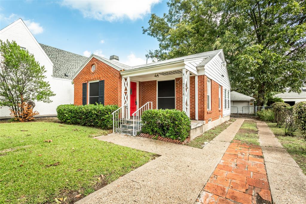 7414 Robin Road Dallas, TX 75209 - Photo 3 of 31 a front view of a house with a yard