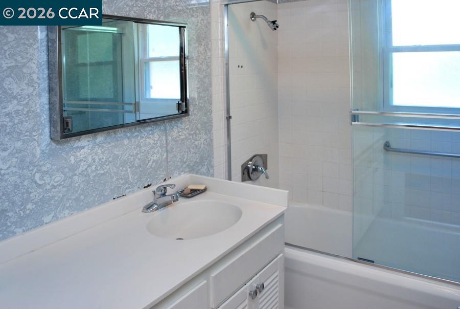 2652 Reliez Valley Road Martinez, CA 94553 - Photo 17 of 34 a bathroom with a sink and a mirror