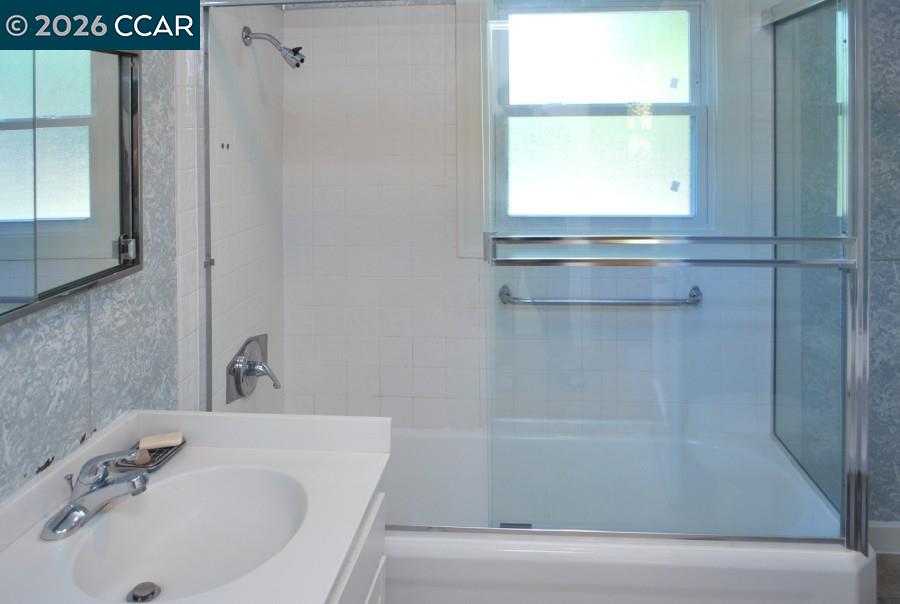 2652 Reliez Valley Road Martinez, CA 94553 - Photo 19 of 34 a bathroom with a tub and a sink