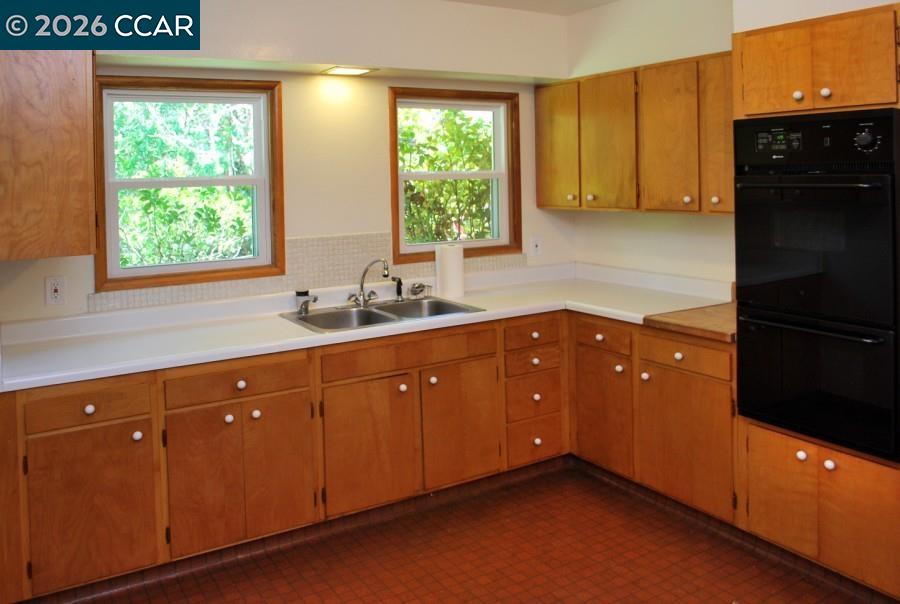 2652 Reliez Valley Road Martinez, CA 94553 - Photo 20 of 34 a kitchen with stainless steel appliances granite countertop cabinets and window