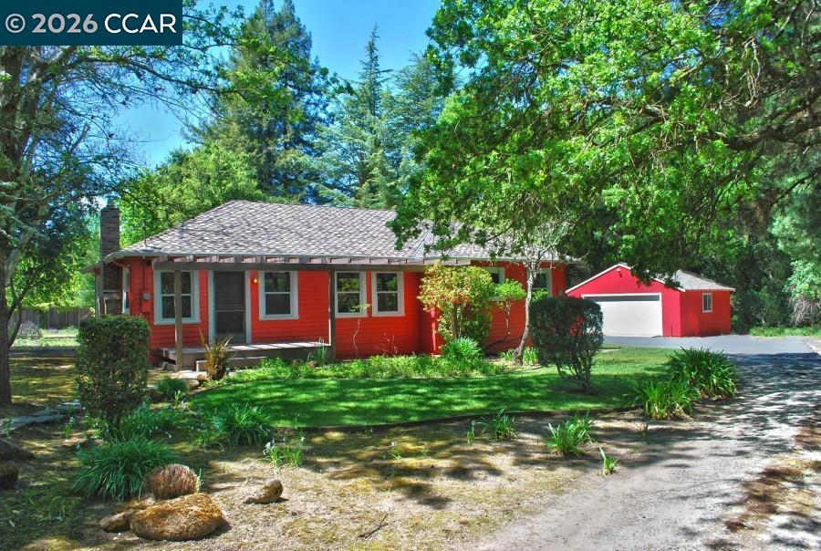 2652 Reliez Valley Road Martinez, CA 94553 - Photo 2 of 34 a front view of house with yard and trees