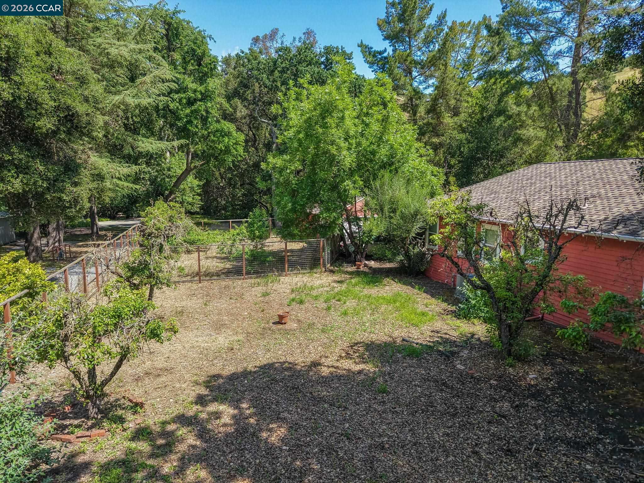2652 Reliez Valley Road Martinez, CA 94553 - Photo 32 of 34 a backyard of a house with lots of green space