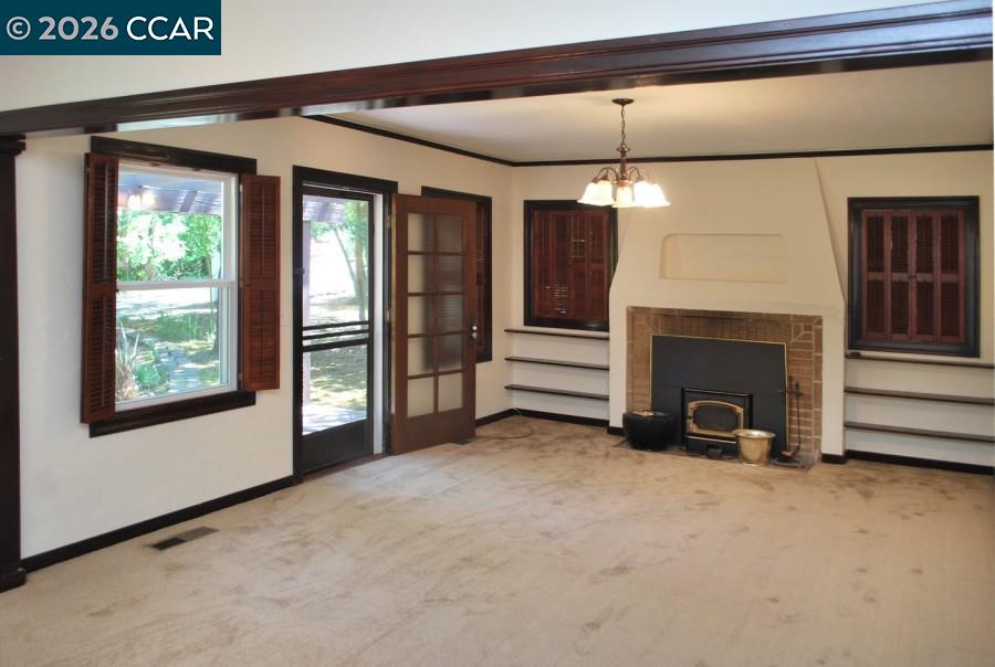 2652 Reliez Valley Road Martinez, CA 94553 - Photo 6 of 34 a view of a livingroom with an empty space and a fireplace