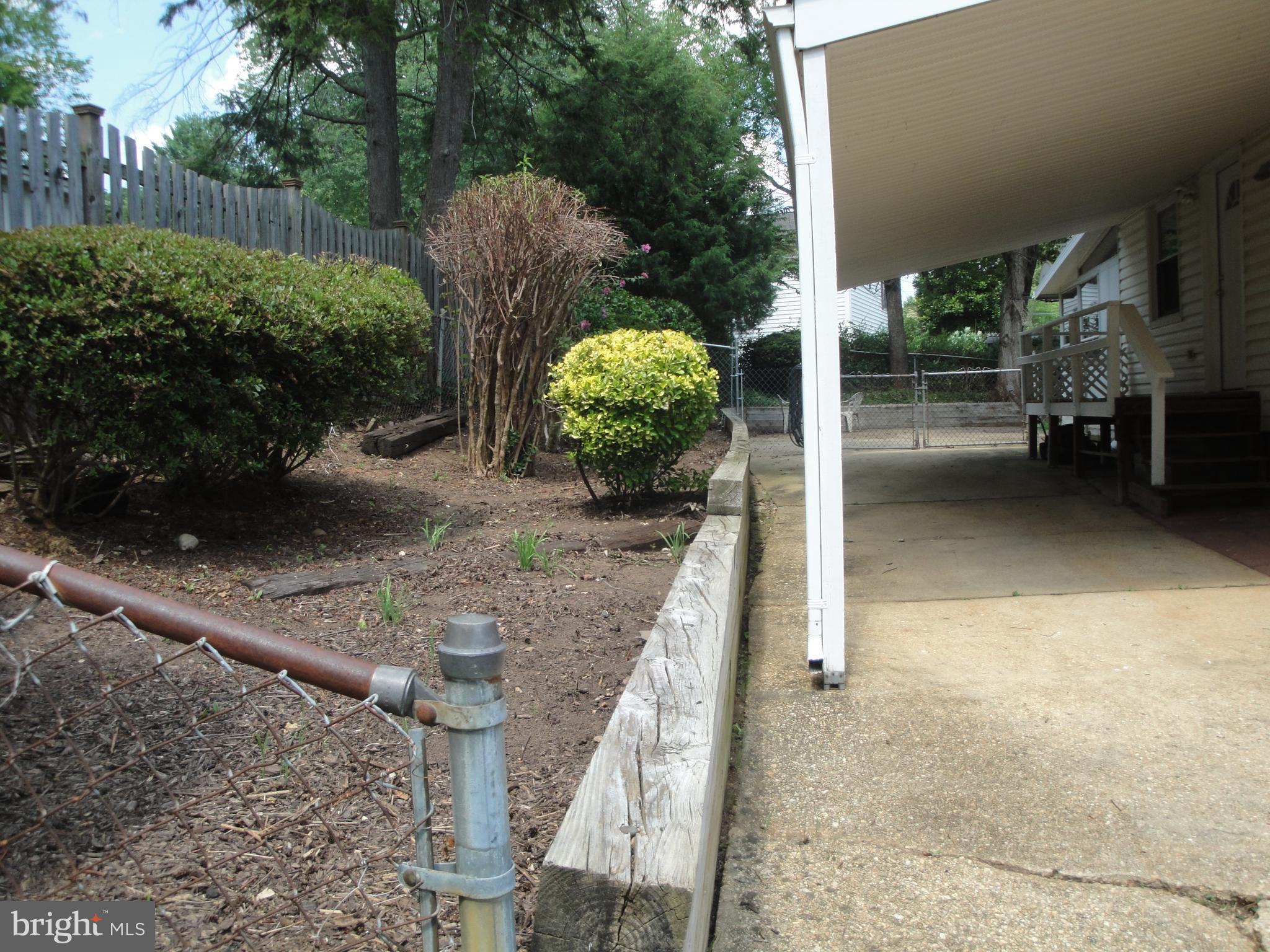 1825 Opalocka Drive McLean, VA 22101 - Photo 4 of 28 a view of backyard with outdoor seating