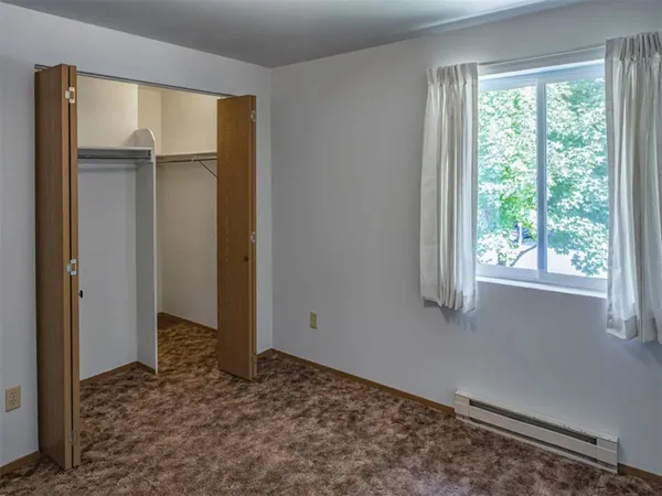 a view of a room that has a window in it